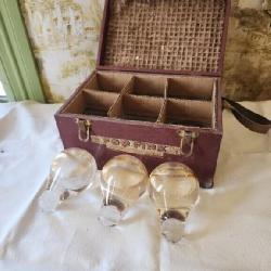 Old glass fire grenades with case.