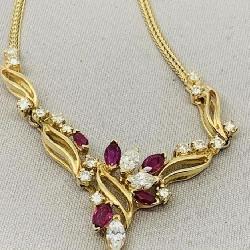 14KT YELLOW GOLD.55CT RUBY & 1.40CT DIAMOND