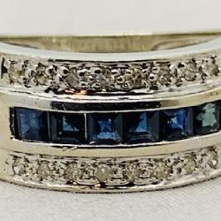 14KT WHITE GOLD .65CT SAPPHIRE & .20CT DIAMOND