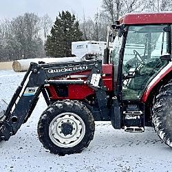 Case IH CX90 4WD tractor with Quicke 640 loader