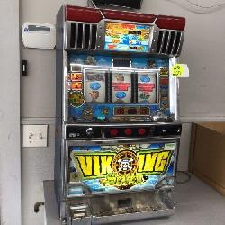 Vintage Viking Seven Slot Machine with Tokens - add a touch of nostalgia to your
