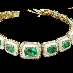 14K YG OSCAR FRIEDMAN EMERALD AND DIAMOND BRACELET
