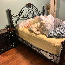 Beautiful king iron bed with bedding 