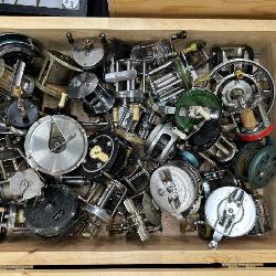 304-  Large case filled with antique fishing reels #1