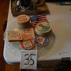 TWO PLASTIC PLATTERS & VINTAGE BEER COASTERS