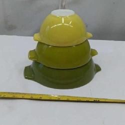 vintage Pyrex Cinderella Mixing Bowls, likely