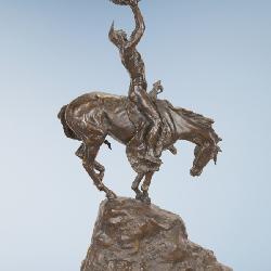 BUCK McCAIN BRONZE SCULPTURE
