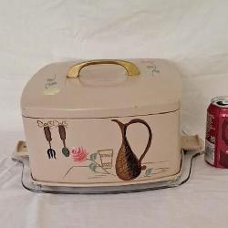 Vintage mid-century Ransburgcake holder, tin top