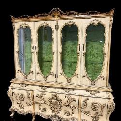 ITALIAN HEAVY CARVED BOMBAY FORMED CHINA CLOSET