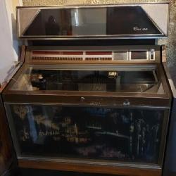 Rowe Ami  Jukebox w 45 records , works depends on