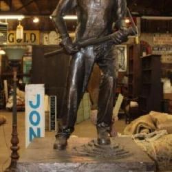 Coal Miner Statue on wood base 
