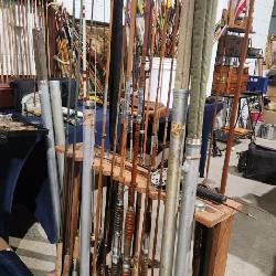 Great Collection of Old Fishing Poles and Reels