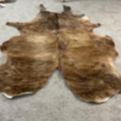Cow hide rug, approx 87x 77 in