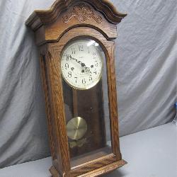 Howard Miller Wall Clock With Pendulum