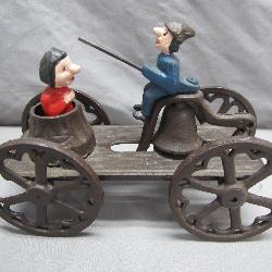 Cast Iron Toy with Riders on Wheels