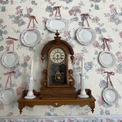 The Ansonia Clock Company tiger head clock, wood