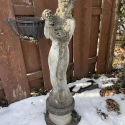 40 inch woman with grape statue at one time was a