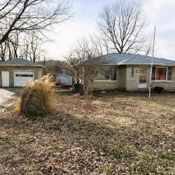 1 BEDROOM, 1 BATH STONE HOME on .83 ACRES!