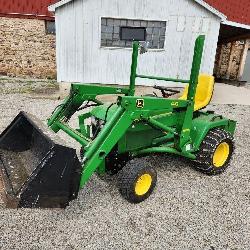 John Deere 445 tractor, #40 loader, mower deck