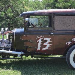 with a 1933 Flathead Ford V8>