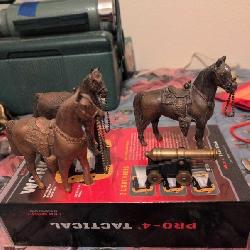 Vintage metal horse figurines (fair prizes) and cannon