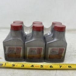 Dolmar 50:1 two cycle engine oil fuel stabilizer.