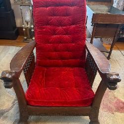 Oak Reclining Morris Chair with Carved Animal Heads and Red Tufted Cushions