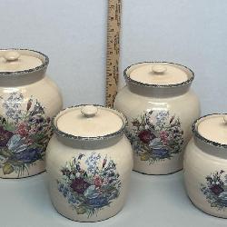 set of four stoneware canisters from Home & Garden Party in their 