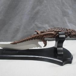 Dinosaur Skeleton Handle Dagger on Stand