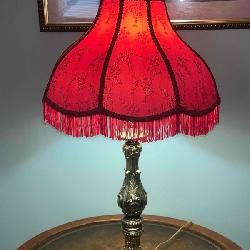 A Pair of Red Lamps with Sequins and Fringe