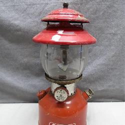 Red Coleman Lantern With Cracked Globe