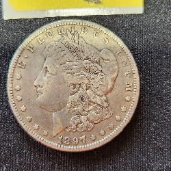 1897 Morgan silver dollar