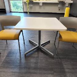 White Top Square Table with 2 Yellow Chairs