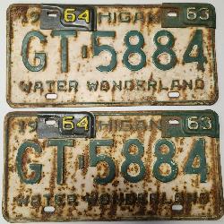 Pair of Matching 1964 Michigan License Plates with Tabs