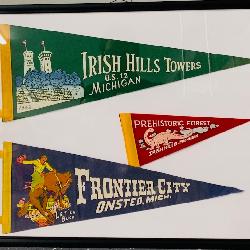 929- Irish Hills, Prehistoric Forest & Frontier City framed Pennant lot.