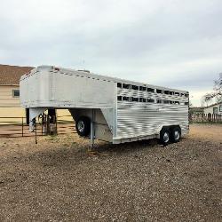 1986 Featherlite 7’x18’ aluminum gooseneck trailer, new floor, rubber mats, rear ramp, sells w/ slant dividers