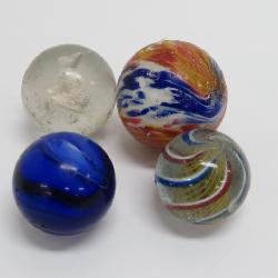 latticino swirl, onionskin, and sulfide marbles