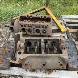 2 ford flat head v8 blocks , heads and motor stand