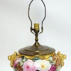 1031	PORCELAIN HAND PAINTED LAMP W/GILT LION HEADS & ROSES ALL OVER, PAW FEET, LAMP HAS HAIRLINE