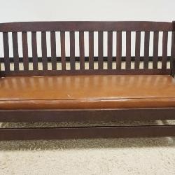 1188	MISSION STYLE OAK SETTEE WITH SLIP CUSHON VINYL COVERED SEAT, TEAR TO VINYL AND REPAIR ON REAR STREATCHER, APPROXIMATELY 77 IN X 27 IN X 39 IN H