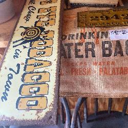 Collectible Advertising Lot: Tobacco Sign, Tater Bag, Match Box and License Plate