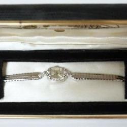 JULES JURGENSEN 14K WHITE GOLD AND 10 DIAMOND COUNTESS LADIES WATCH IN ORIGNAL PACKAGING, 10.4DWT