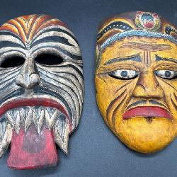 Pair of Hand-Carved Tribal Style Wall Masks
