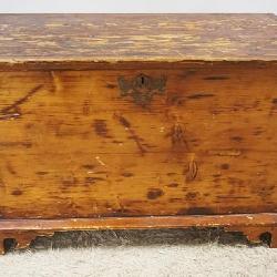 1177	PRIMITIVE PINE BLANKET CHEST ON SCROLLED BRACKET FEET, WEAR ON TOP, APPROXIMATELY 19 IN X 35 IN X 22 IN HIGH