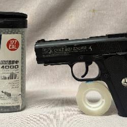 503 - COLT DEFENDER BB PISTOL, DAISY BBs (C34)