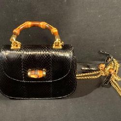 Gucci Small Black Snakeskin Handbag With Bamboo Handle. 