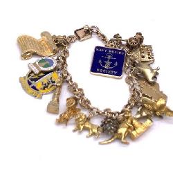 Vintage Gold Filled Charm Bracelet With Numerous Charms Including 4 That Are 9 Karat Gold (.375).