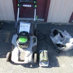 E-Go 56V Power self propelled electric lawn mower, comes with battery and charger all works great, a