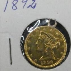 1892 GOLD LIB. HEAD W/ PEZEL