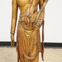 1054	LIFE SIZE CARVED ASIAN STATUE, APPROXIMATELY 59 IN HIGH